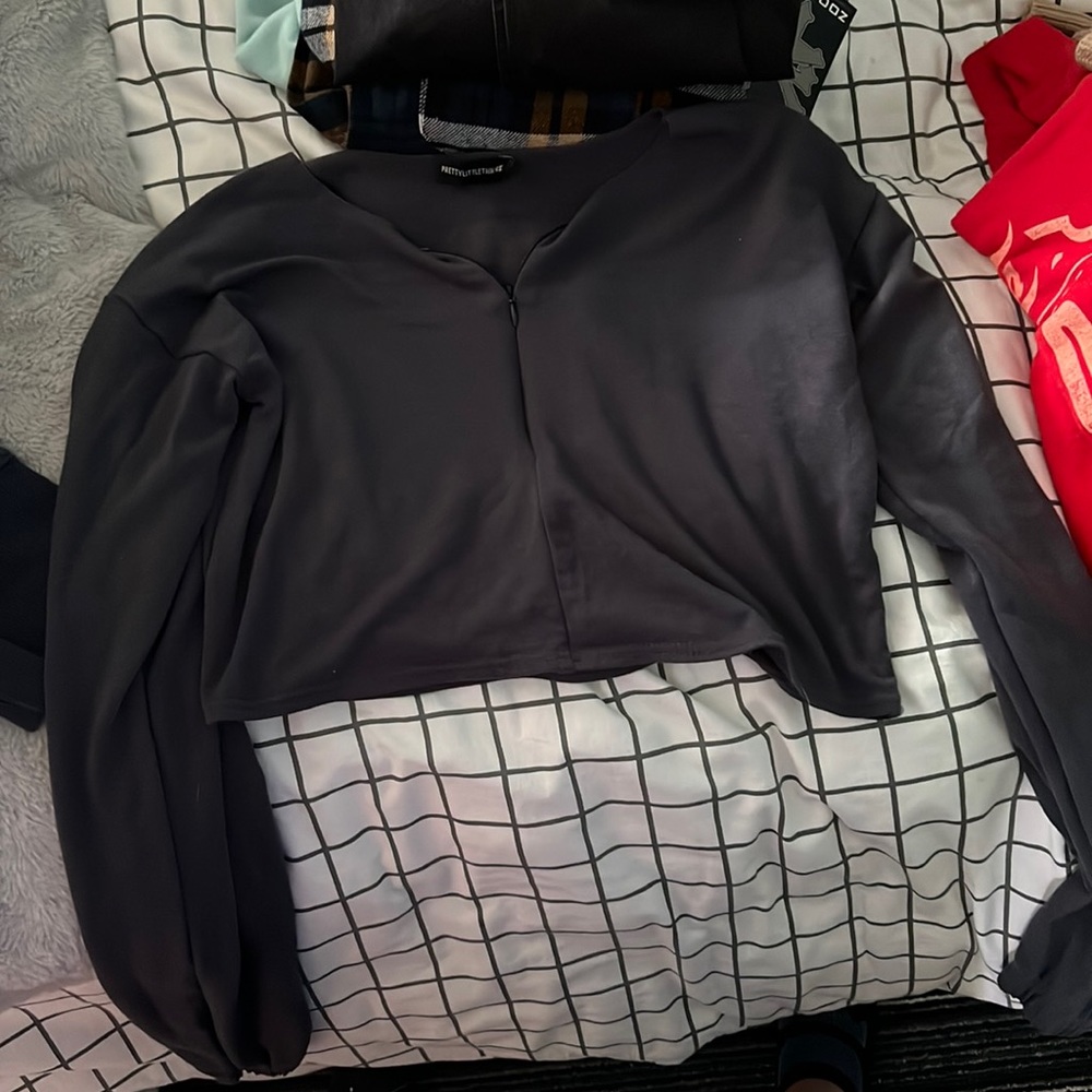 This is a gray/navy long sleeve from pretty little thing